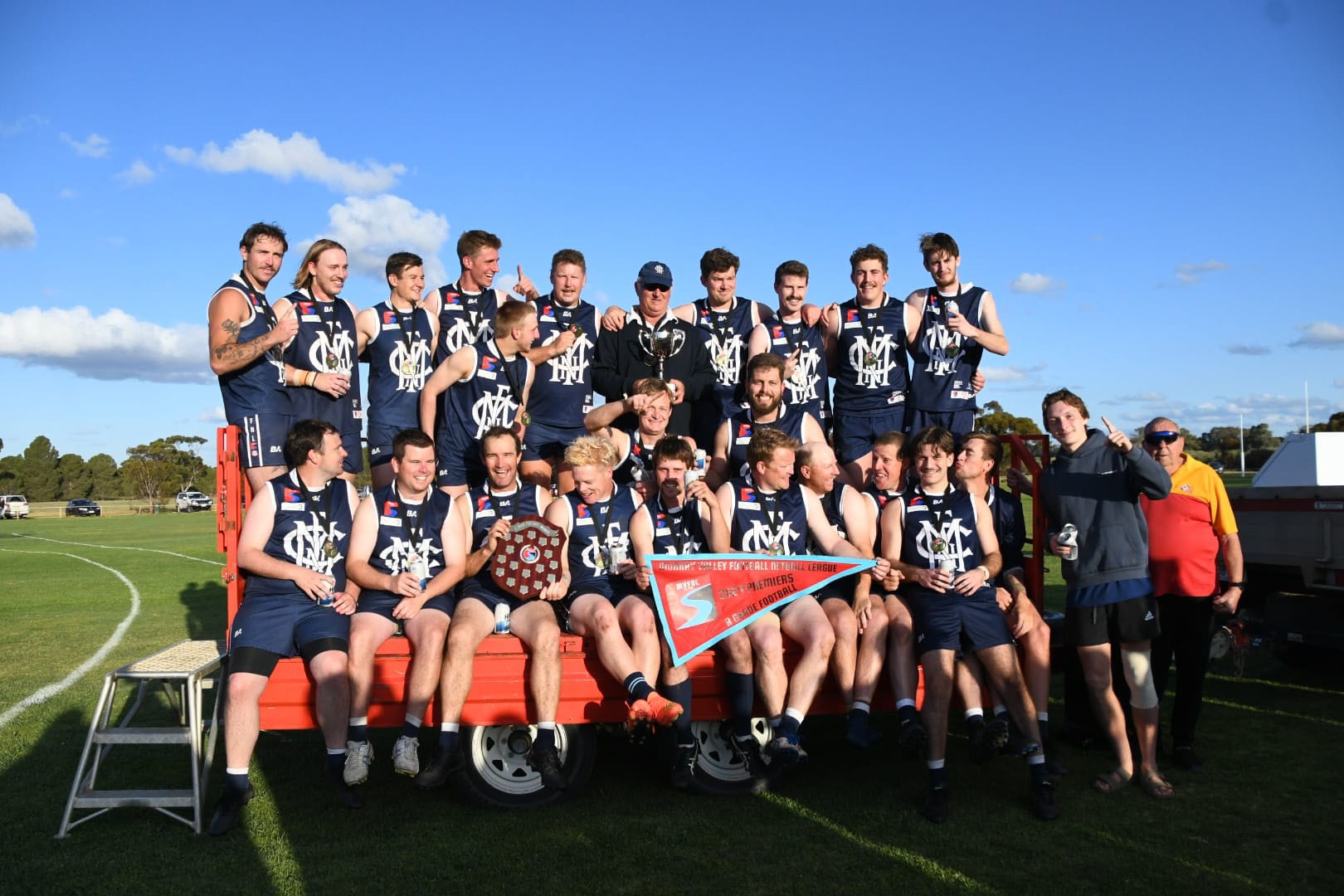Footy premiers change coach
