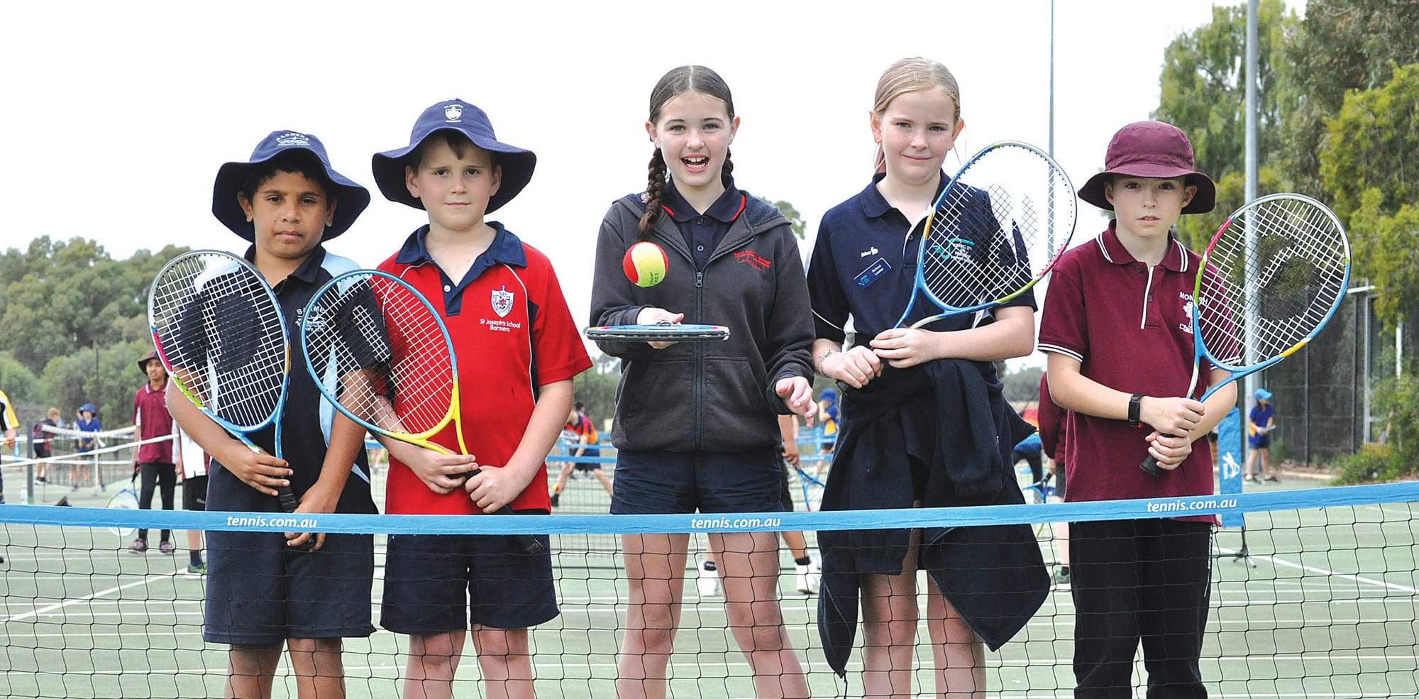 Kids on the tennis court