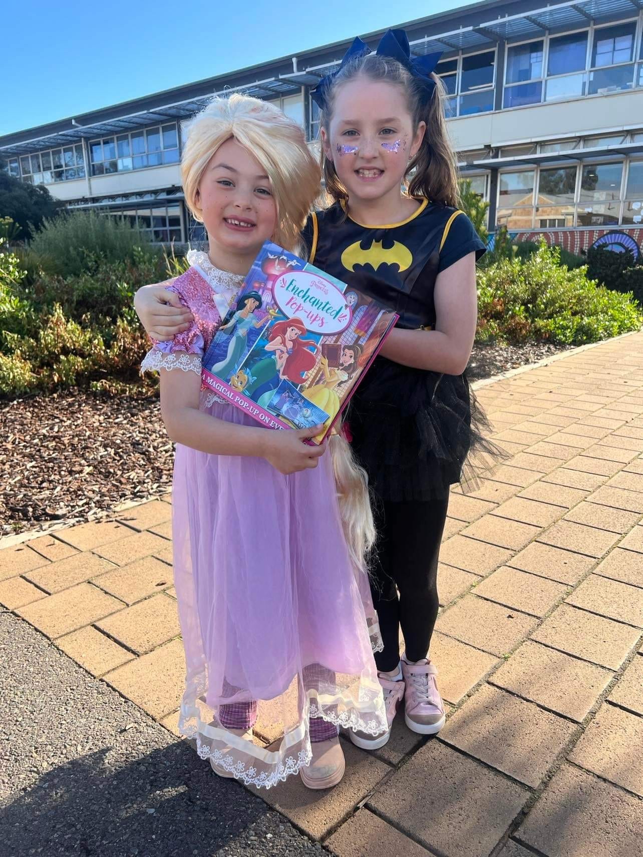Renmark Primary School students Zienna Doevendans, 5, and Navannah Pollard, 9, as Rapunzel and Batgirl.