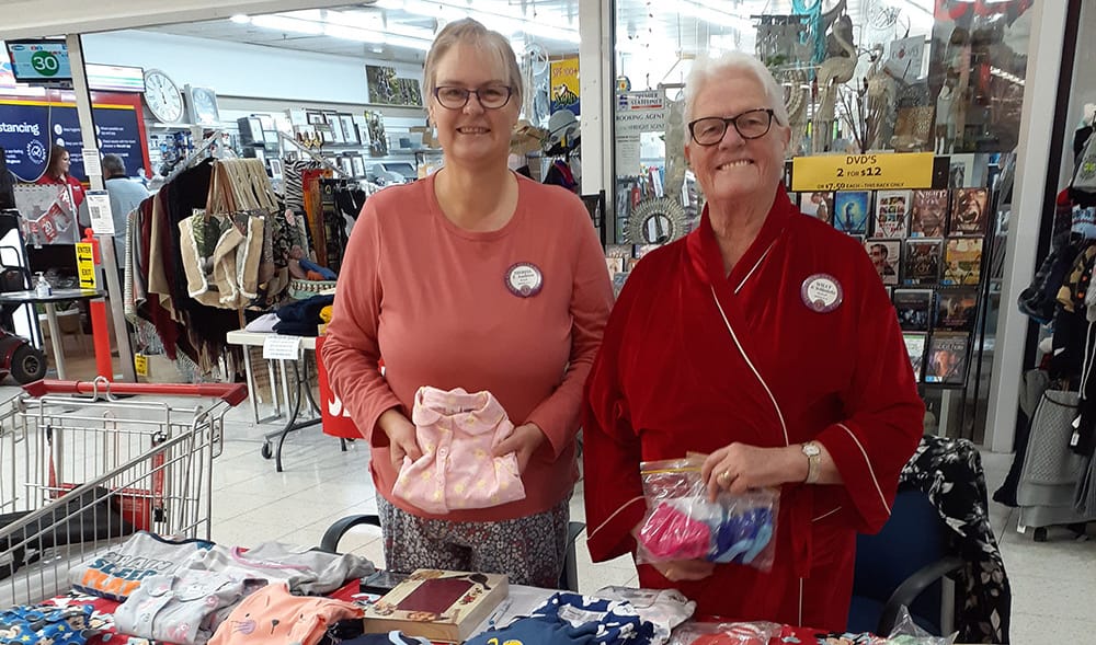 PJs and pizza party for a good cause