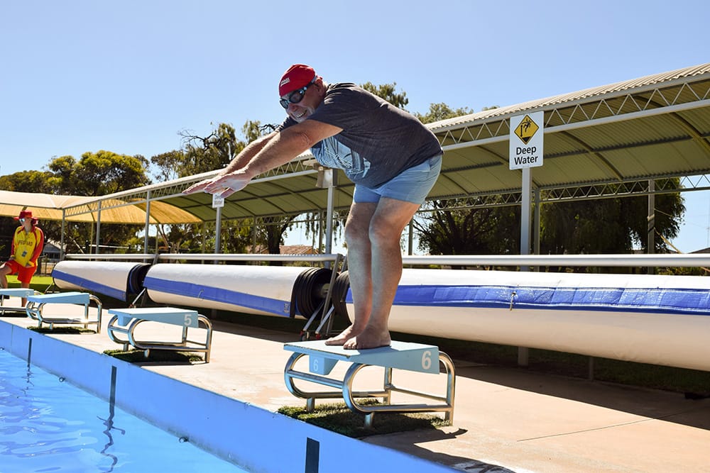 Michael diving in for Super Swim Challenge