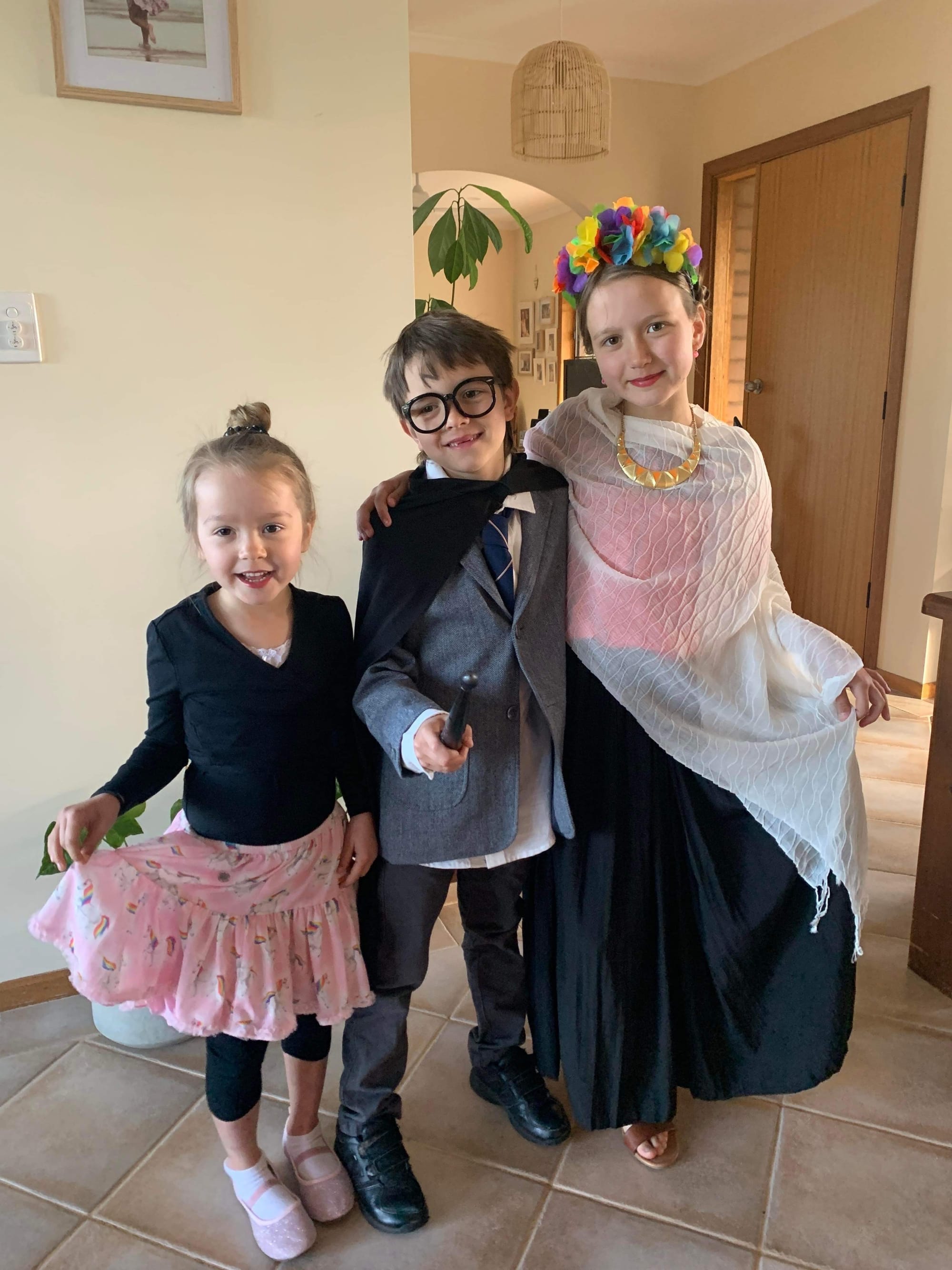 Renmark West kindergartener Anna, 4, and St Joseph’s School Renmark students Jacob, 6, and Mya Elliot, 8, as a ballerina, Harry Potter and Frida Kahlo.