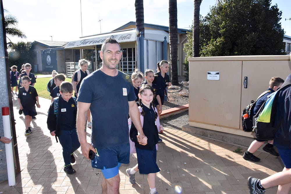 Local students lace up to walk safely to school post image