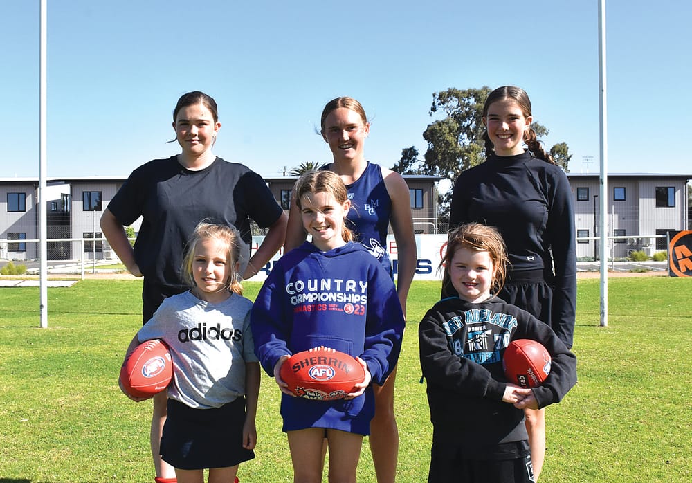 Play on for girls footy post image