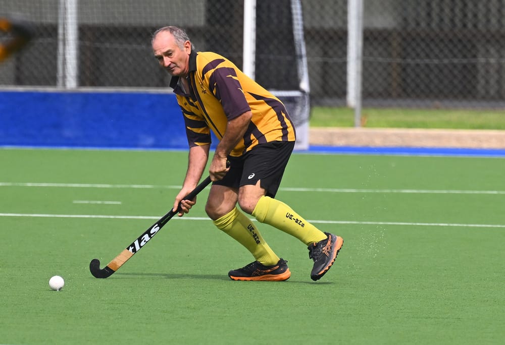 Cass reaches hockey half century post image