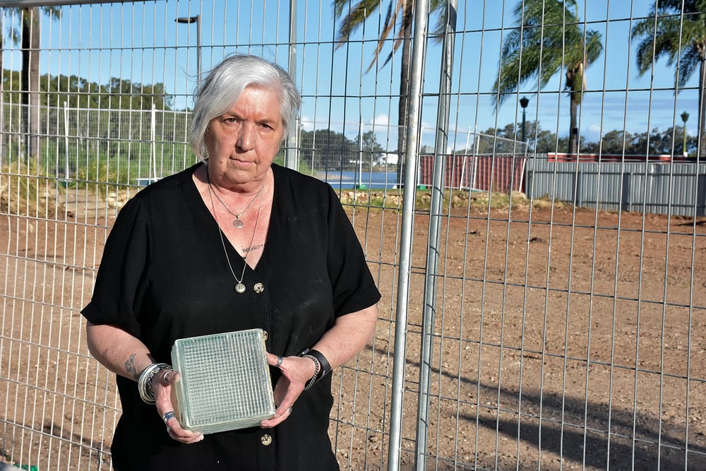 A (glass) brick in the wall post image