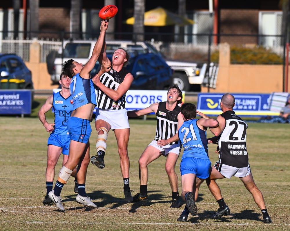 Roos move through to the top two post image
