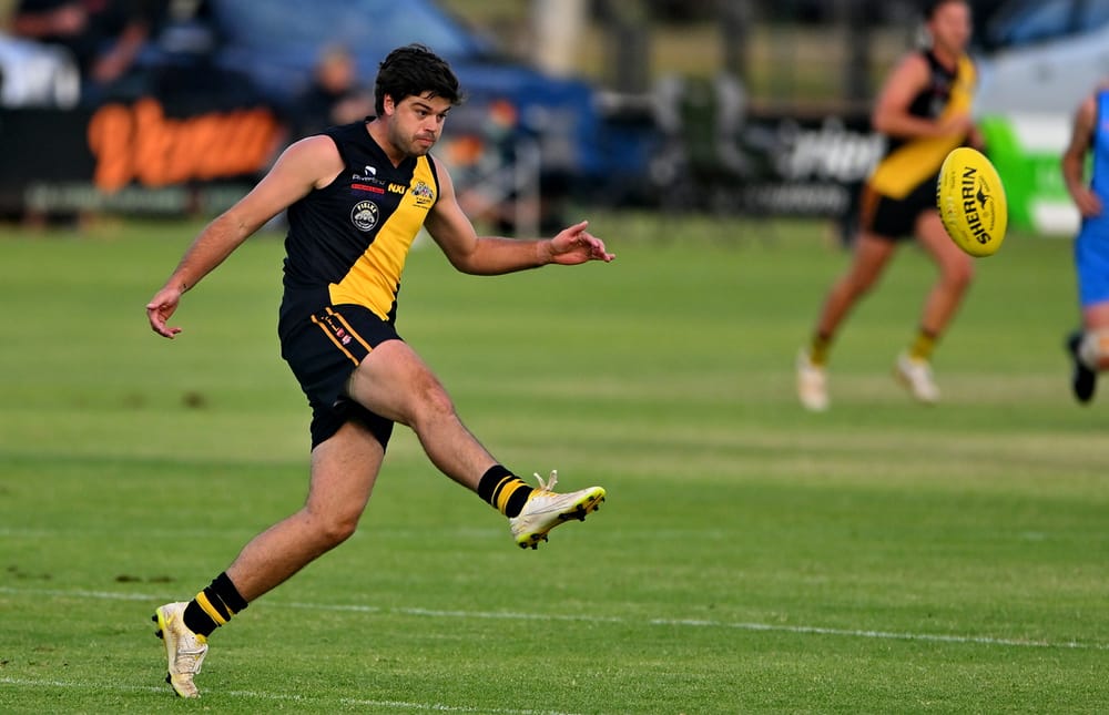 Tigers hold on as Brown records first win post image