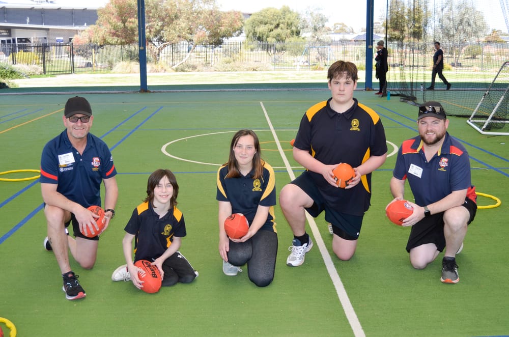 Special school welcomes back footy with open arms post image